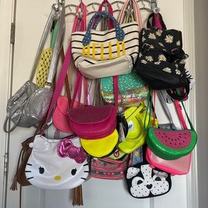 25 gently used girls purses and 2 waist bags